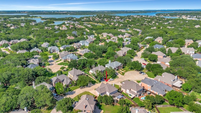 940 Crown Ct, Highland Village, TX 75077 - aerial view of property's location with a nearby body of water and nearby suburban area