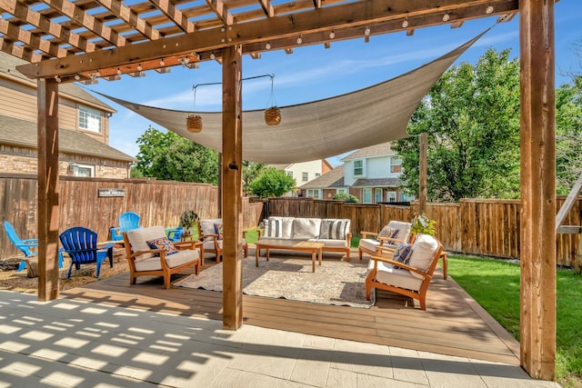 940 Crown Ct, Highland Village, TX 75077 - fenced backyard with outdoor lounge area, a pergola, and a wooden deck