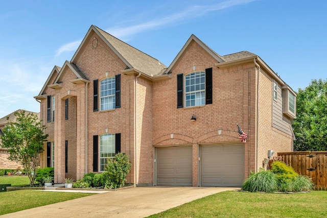 940 Crown Ct, Highland Village, TX 75077 - view of front of property featuring brick siding, concrete driveway, and an attached garage
