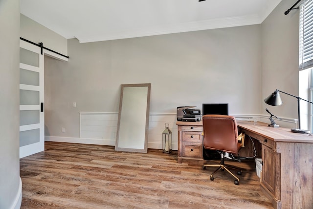 940 Crown Ct, Highland Village, TX 75077 - office featuring a barn door, ornamental molding, and wood finished floors