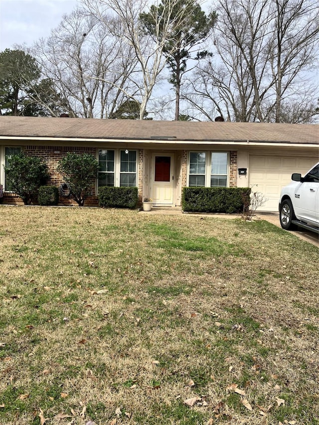9008 Sara Ln Unit 1, Shreveport, LA 71118 - single story home with a garage, brick siding, and a front lawn
