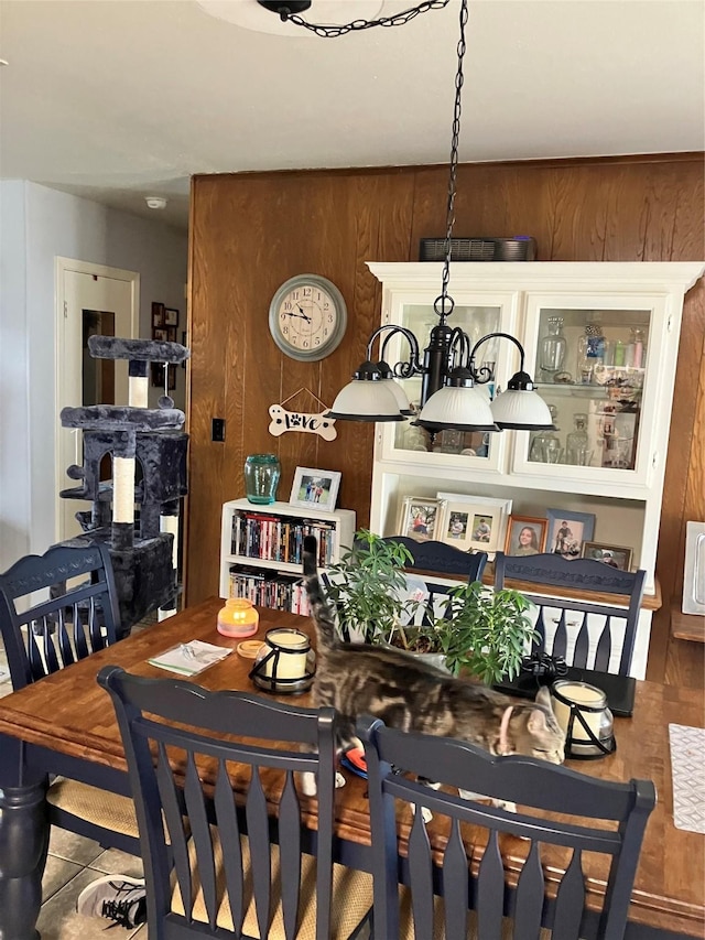 9008 Sara Ln Unit 1, Shreveport, LA 71118 - dining area featuring wood walls