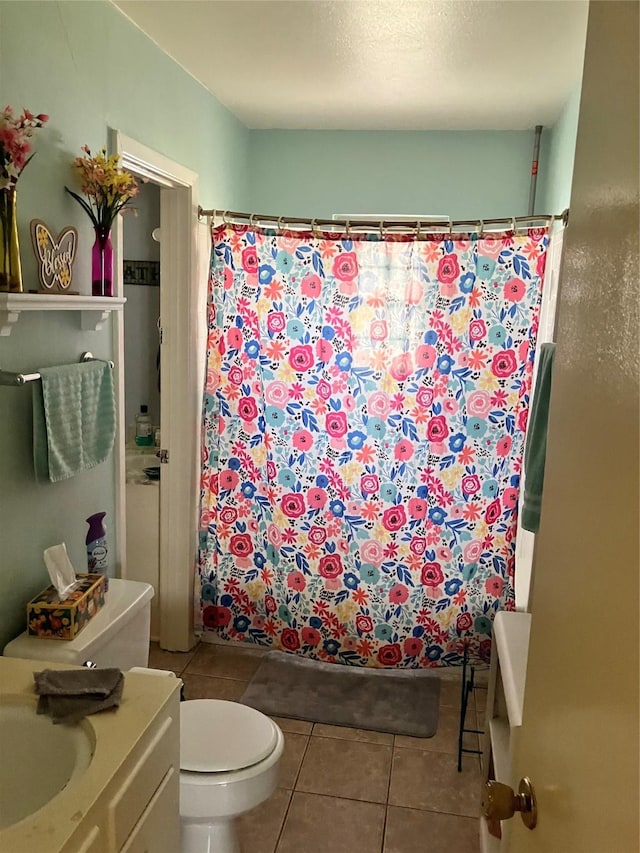 9008 Sara Ln Unit 1, Shreveport, LA 71118 - full bathroom featuring tile patterned floors, toilet, and a sink