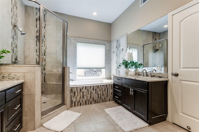 1117 Brandy Sta, Richardson, TX 75080 - full bath with tile patterned floors, a shower stall, vanity, and a bath