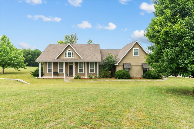 415 Stone Mountain Ct, Cresson, TX 76035 - view of front facade with a porch, a front lawn, and roof with shingles