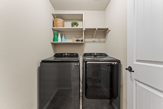 8400 Sioux Trl, Aubrey, TX 76227 - laundry room with washer and dryer and a textured wall