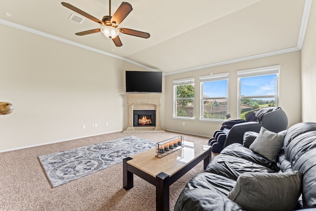 8400 Sioux Trl, Aubrey, TX 76227 - living area featuring carpet, crown molding, ceiling fan, a lit fireplace, and vaulted ceiling