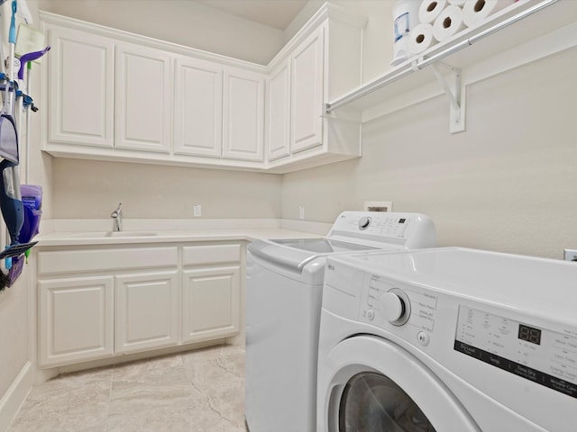 897 Clear Water Dr, Allen, TX 75013 - washroom featuring washing machine and dryer, cabinet space, and baseboards