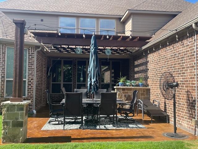 897 Clear Water Dr, Allen, TX 75013 - view of patio / terrace with a pergola and outdoor dining area
