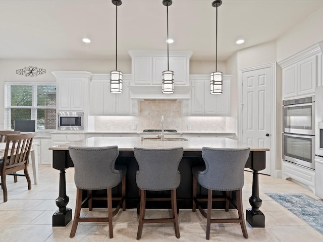 897 Clear Water Dr, Allen, TX 75013 - kitchen with appliances with stainless steel finishes, tasteful backsplash, white cabinetry, decorative light fixtures, and recessed lighting