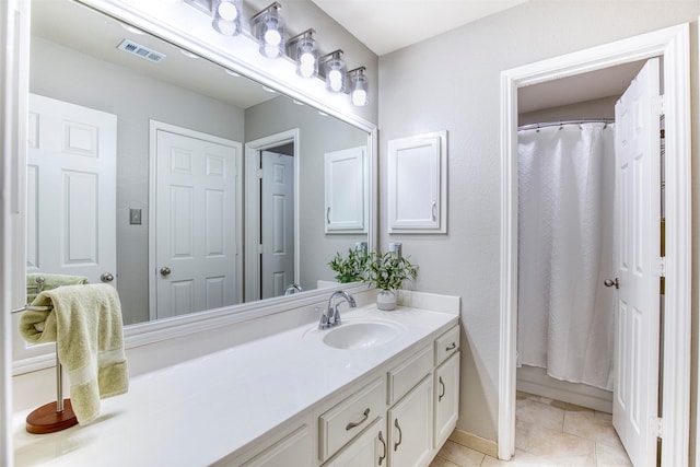 10108 Hunter Run, Frisco, TX 75035 - full bathroom with vanity, tile patterned flooring, and a shower with shower curtain