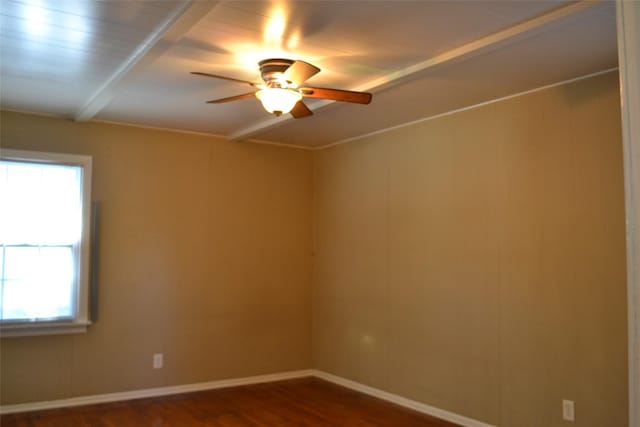 202 Pine St, Arlington, TX 76011 - empty room featuring ceiling fan, plenty of natural light, dark wood-style floors, and baseboards