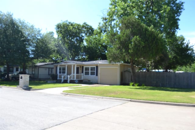 202 Pine St, Arlington, TX 76011 - ranch-style house featuring an attached garage and driveway