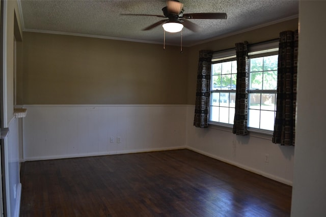 202 Pine St, Arlington, TX 76011 - spare room featuring wood finished floors, a ceiling fan, a textured ceiling, ornamental molding, and baseboards