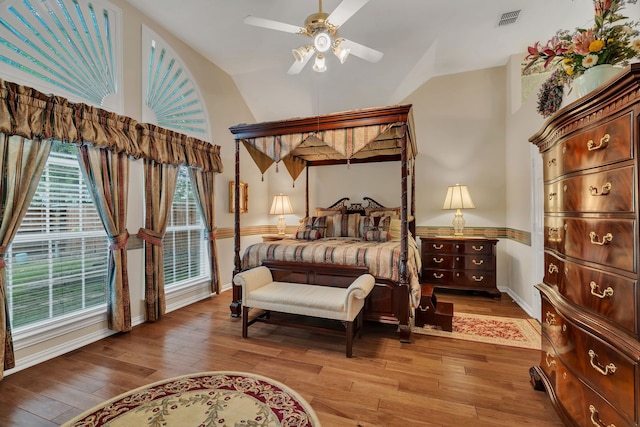 3916 Navajo Ln, Bedford, TX 76021 - bedroom featuring hardwood / wood-style floors, lofted ceiling, a ceiling fan, and baseboards