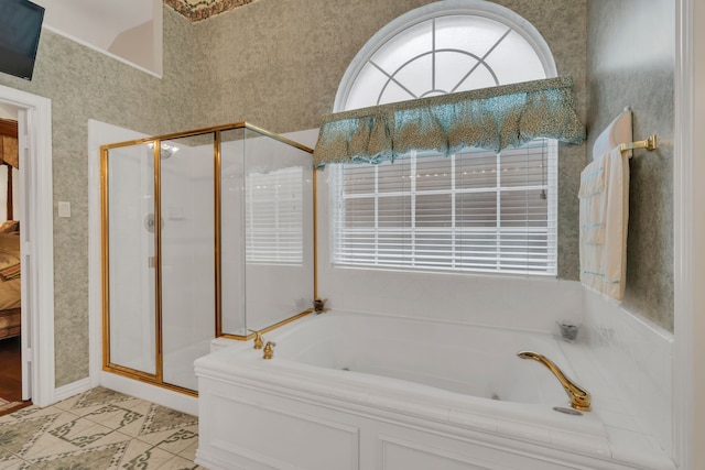 3916 Navajo Ln, Bedford, TX 76021 - bathroom featuring a stall shower, a garden tub, and tile patterned flooring