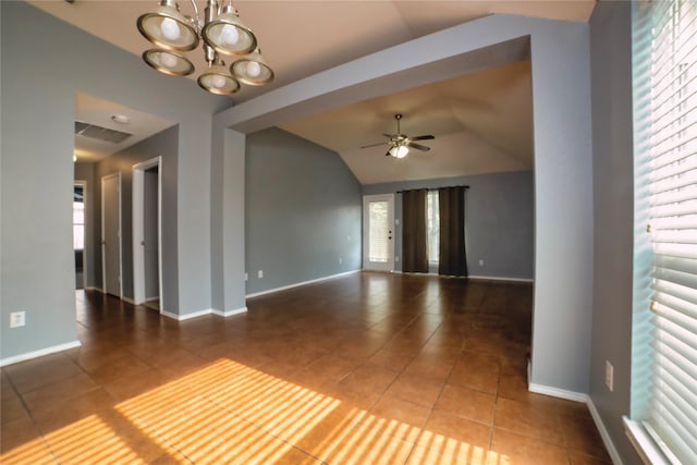 2949 Stockton St, Denton, TX 76209 - tiled spare room with vaulted ceiling, a chandelier, ceiling fan, and baseboards