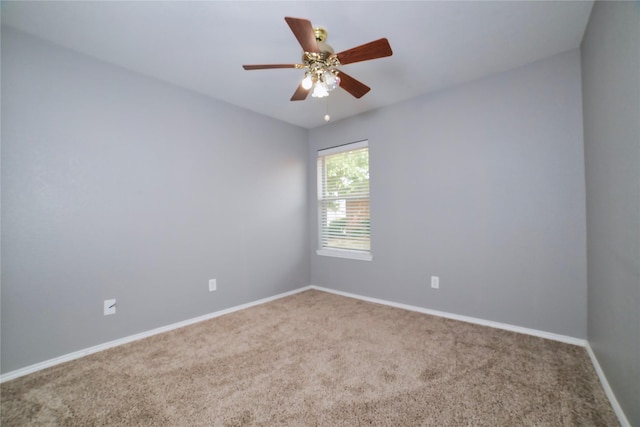 2949 Stockton St, Denton, TX 76209 - carpeted spare room featuring baseboards and a ceiling fan