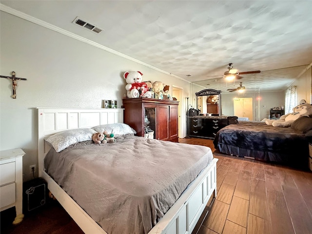 2725 Rustown Dr, Mesquite, TX 75150 - bedroom featuring wood finished floors and crown molding
