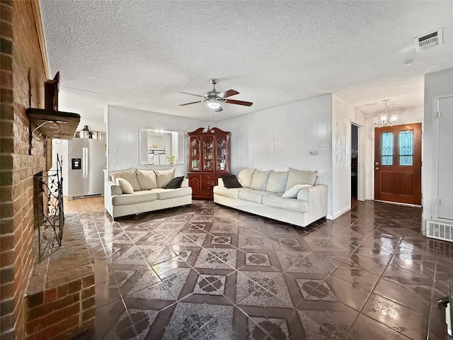 2725 Rustown Dr, Mesquite, TX 75150 - living room with a ceiling fan, a chandelier, and a textured ceiling