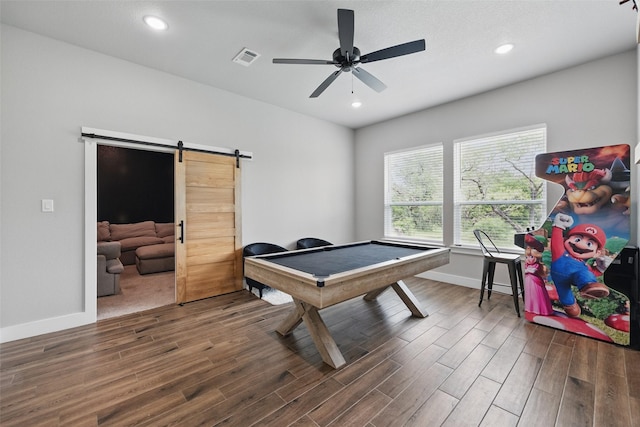 304 Red Roan Rdg, Weatherford, TX 76087 - playroom featuring a barn door, wood finished floors, baseboards, a ceiling fan, and recessed lighting