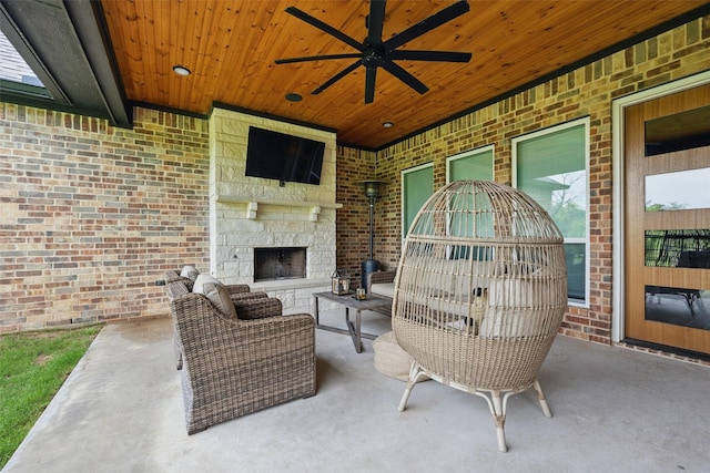 304 Red Roan Rdg, Weatherford, TX 76087 - view of patio / terrace featuring ceiling fan and an outdoor living space with a fireplace