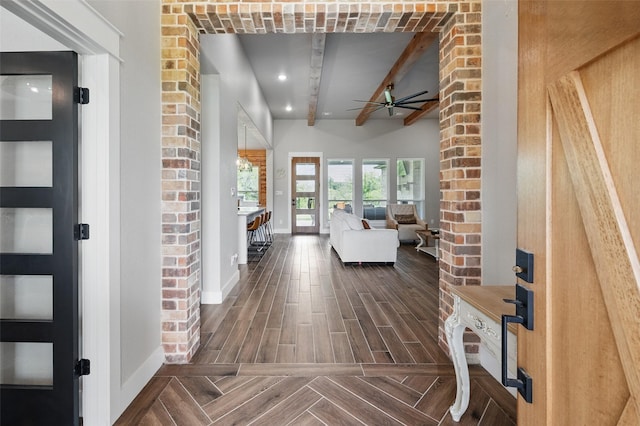 304 Red Roan Rdg, Weatherford, TX 76087 - foyer featuring a ceiling fan, baseboards, beam ceiling, and wood finished floors