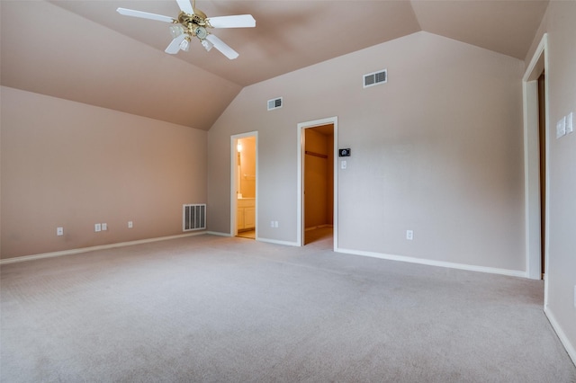 6506 Parkside Dr, Arlington, TX 76001 - unfurnished bedroom featuring lofted ceiling, light colored carpet, a walk in closet, ensuite bath, and ceiling fan