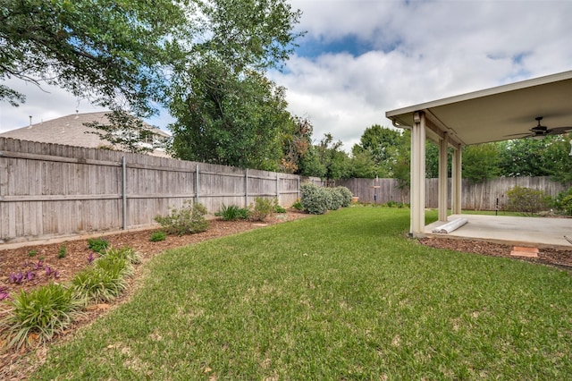 6506 Parkside Dr, Arlington, TX 76001 - fenced backyard featuring a patio area and a ceiling fan