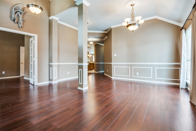 6506 Parkside Dr, Arlington, TX 76001 - unfurnished living room featuring dark wood-style flooring, a chandelier, crown molding, lofted ceiling, and decorative columns