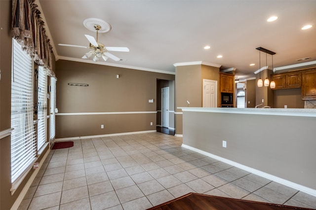 6506 Parkside Dr, Arlington, TX 76001 - kitchen featuring black microwave, ornamental molding, light tile patterned floors, a ceiling fan, and recessed lighting