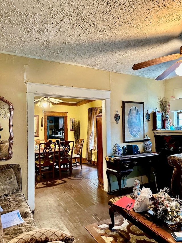 803 S Oak Cliff Blvd, Dallas, TX 75208 - living area with a ceiling fan and a textured ceiling