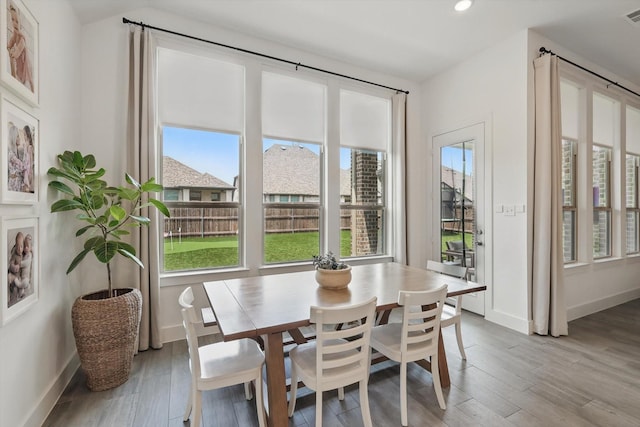 1809 Lithgow Rd, Celina, TX 75009 - dining area featuring wood finished floors, baseboards, and recessed lighting