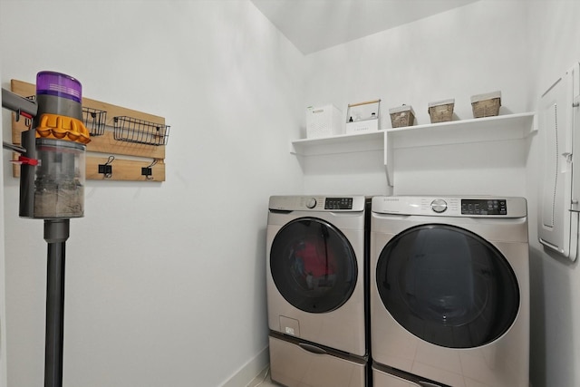 1809 Lithgow Rd, Celina, TX 75009 - laundry room featuring washing machine and clothes dryer and baseboards
