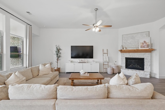 1809 Lithgow Rd, Celina, TX 75009 - living room featuring ceiling fan, a fireplace, wood finished floors, and baseboards