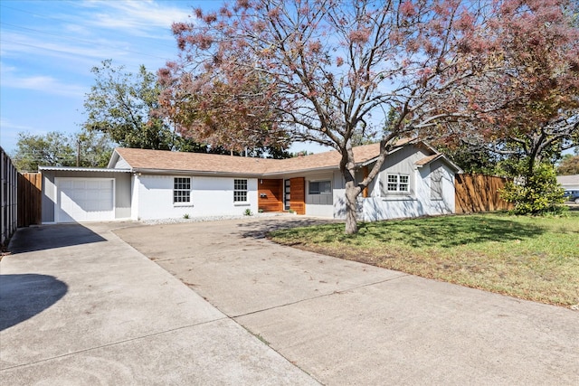 1705 Provincetown Ln, Richardson, TX 75080 - ranch-style house featuring concrete driveway and an attached garage
