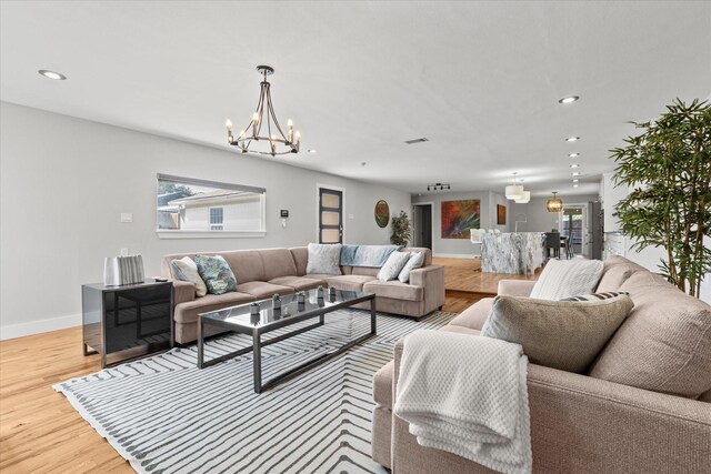 1705 Provincetown Ln, Richardson, TX 75080 - living room with a chandelier, wood finished floors, recessed lighting, and baseboards