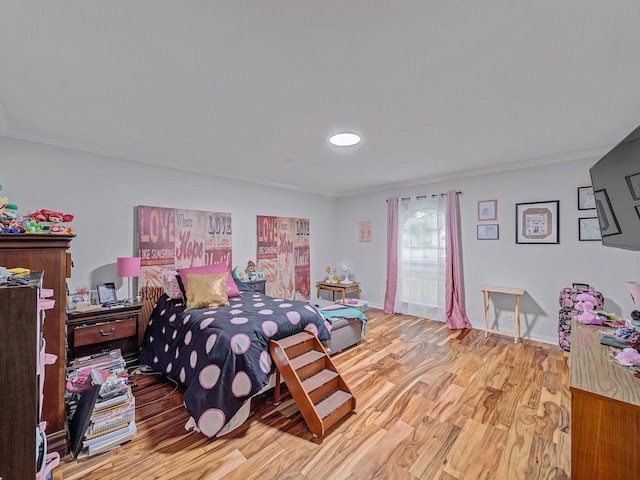 1824 Castille Dr, Carrollton, TX 75007 - bedroom with wood finished floors, crown molding, and baseboards