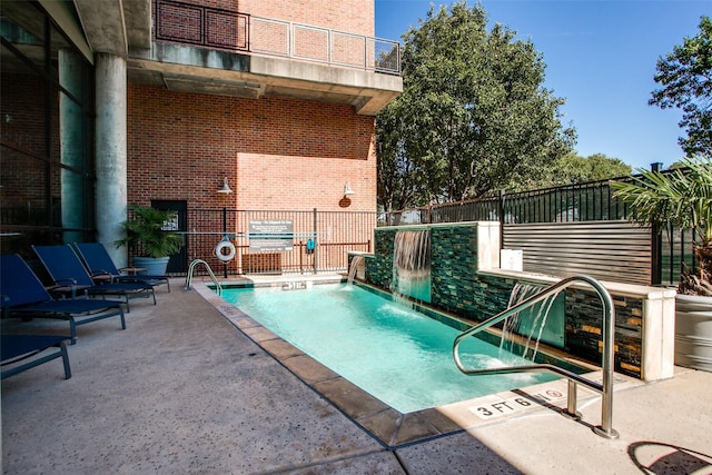 3110 Thomas Ave Unit 535, Dallas, TX 75204 - community pool with a patio area