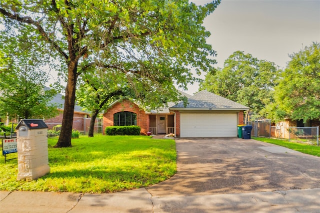 2812 Howard Ct, Denton, TX 76209 - view of front of house with driveway, a garage, brick siding, and roof with shingles