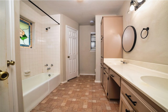 2812 Howard Ct, Denton, TX 76209 - full bathroom featuring shower / tub combination, baseboards, and double vanity