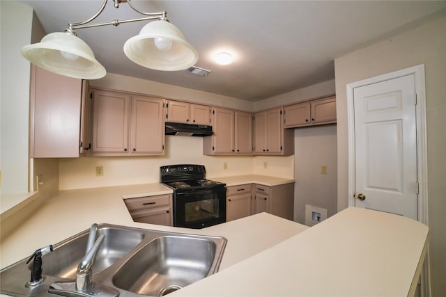 2812 Howard Ct, Denton, TX 76209 - kitchen featuring black / electric stove, under cabinet range hood, a sink, and light countertops