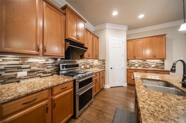 624 Ansley Way, Allen, TX 75013 - kitchen featuring double oven range, a sink, ornamental molding, black microwave, and backsplash