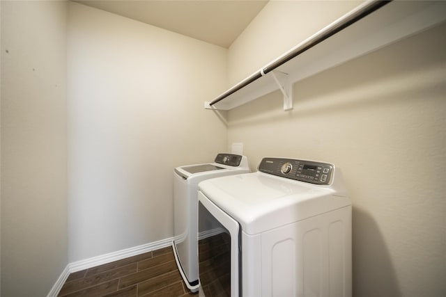 624 Ansley Way, Allen, TX 75013 - laundry area featuring washing machine and clothes dryer, wood finish floors, and baseboards