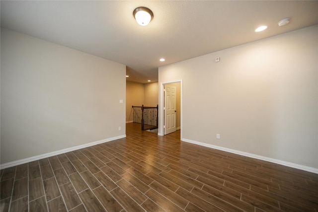 624 Ansley Way, Allen, TX 75013 - empty room with dark wood finished floors, baseboards, and recessed lighting