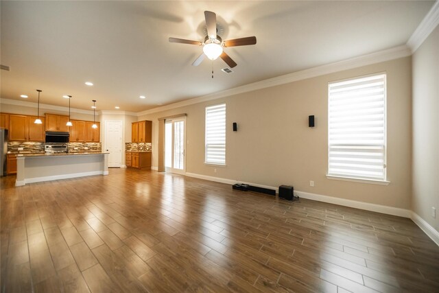 624 Ansley Way, Allen, TX 75013 - unfurnished living room with a ceiling fan, dark wood finished floors, healthy amount of natural light, baseboards, and crown molding