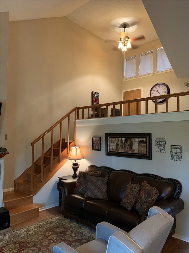 151 Summer Place Cir, Pottsboro, TX 75076 - living room featuring wood finished floors, a ceiling fan, stairs, high vaulted ceiling, and baseboards