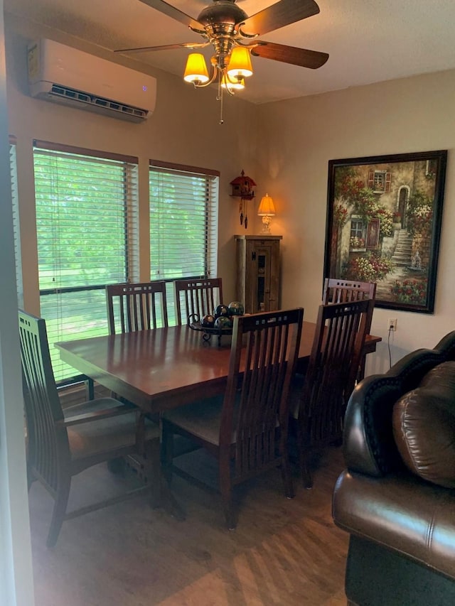 151 Summer Place Cir, Pottsboro, TX 75076 - dining area with a wall mounted air conditioner, a ceiling fan, plenty of natural light, and wood finished floors
