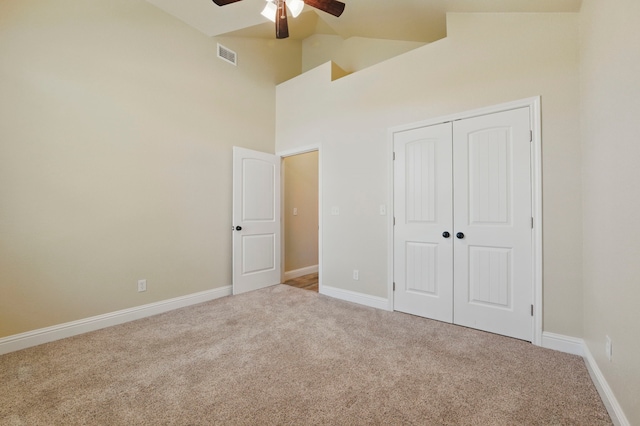 2304 Forest Hill Ln, Granbury, TX 76048 - unfurnished bedroom featuring carpet flooring, high vaulted ceiling, a closet, and baseboards
