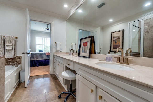3303 Blackburn St Unit 402, Dallas, TX 75204 - ensuite bathroom featuring crown molding, double vanity, recessed lighting, tile patterned flooring, and a garden tub
